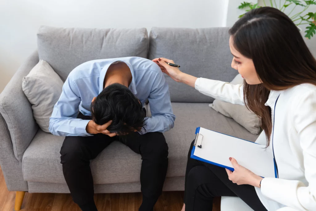 upset-doctor-head-between-his-hands