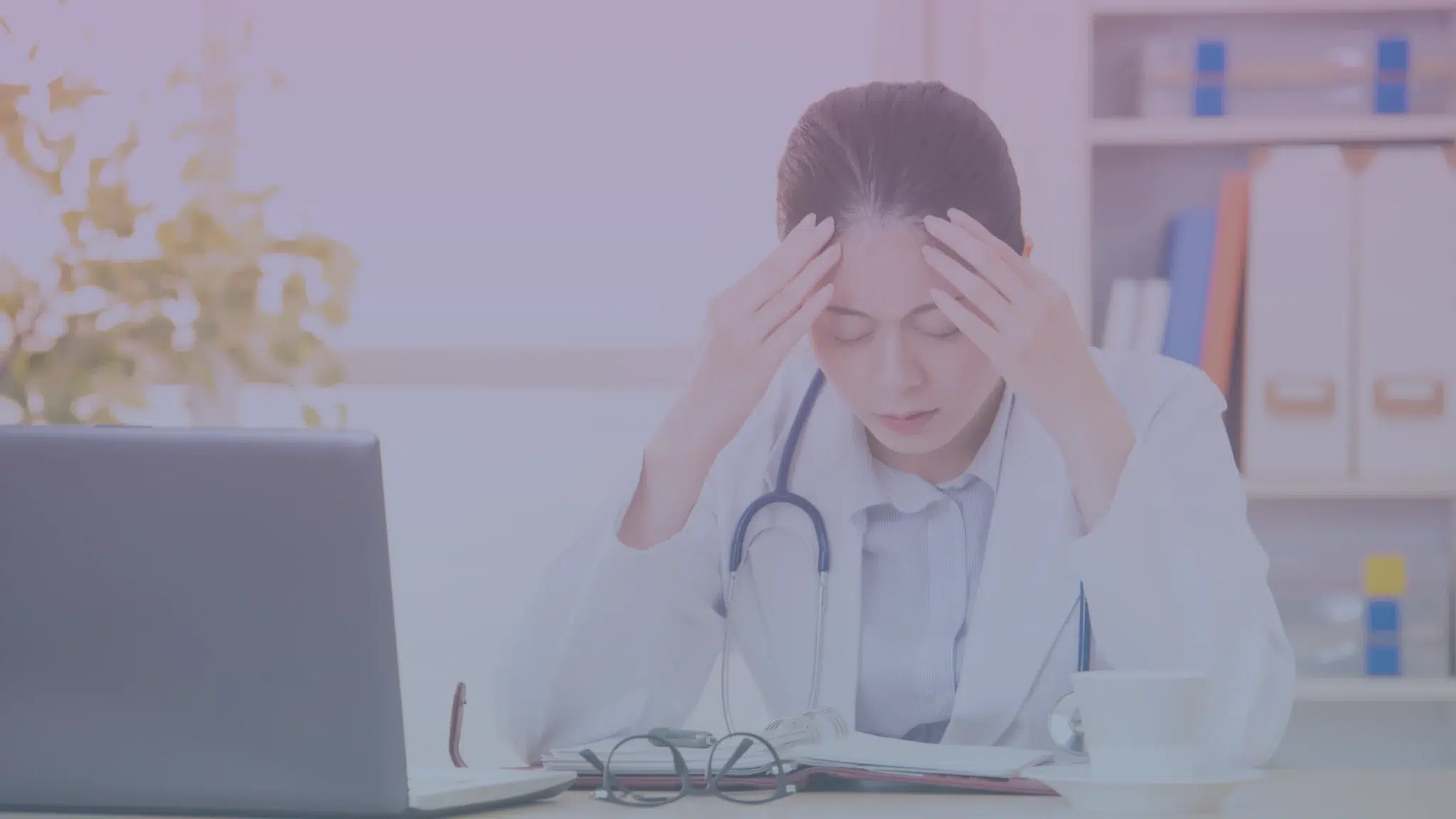 female international asian Doctor stressed